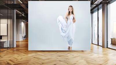 Blonde Woman in Waving White Dress Wall mural