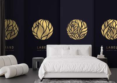 Vector set of golden floral circle logos, leaves labels. Package design, nature concept for beauty products, organic and eco icons Wall mural