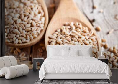 wheat grain in wooden spoons Wall mural