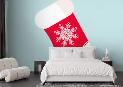 Christmas sock with white snowflake.. Flat icon on a white background. Vector illustration. Wall mural