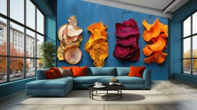 Dried Vegetables. Organic Diet with Colorful Carrot, Beet, and Parsnip Chips on Blue Backgrounds Wall mural