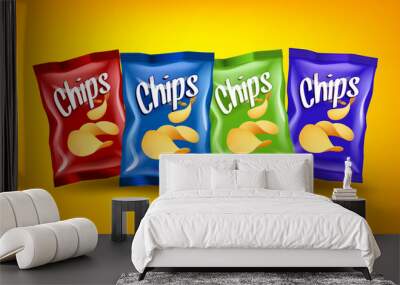 Set of red, blue and green chips packages with yellow crispy snacks, advertising concept Wall mural