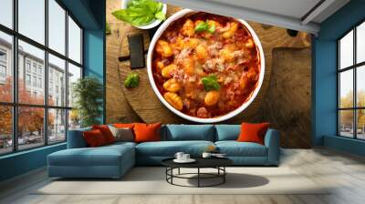 Baked potato gnocchi with tomato sauce and basil Wall mural