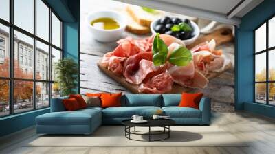 Charcuterie board with fresh basil Wall mural