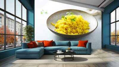 Healthy vegan turmeric rice with fresh parsley Wall mural