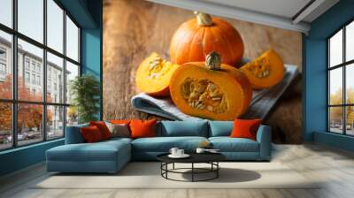 Ripe pumpkin on wooden desk Wall mural