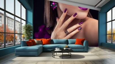 Beautiful woman with perfect make-up and manicure wearing jewellery Wall mural