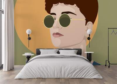 1293_Handsome young man wearing golden round sunglasses Wall mural