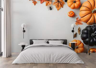 A Creative Flat Lay of Halloween Pumpkins and Decorations with Blank Copy Space for a Festive Design Wall mural