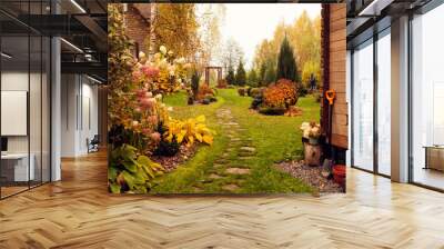 beautiful autumn garden view with curvy lawn pathway. Private natural country garden in october Wall mural