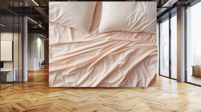 Elegant satin sheets in soft light, luxury and sophistication in the bedroom, peach fuzz color tones Wall mural