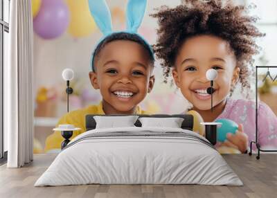 Two happy girls wearing bunny ears with Easter eggs. Concept: friendship, holiday joy. Wall mural