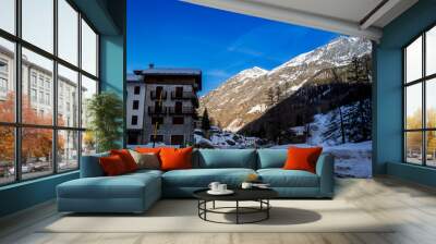 alpine panorama, snowy mountains with blue sky Wall mural