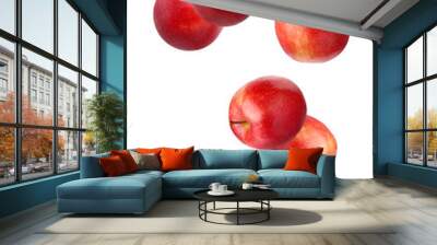 Falling red apples isolated on white. Wall mural