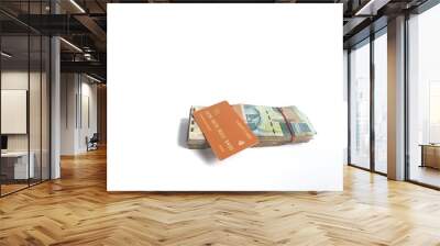 Rupiah banknotes and credit cards on a white background Wall mural