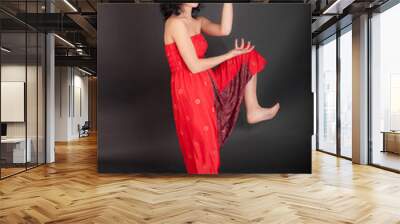 girl in red trousers Wall mural