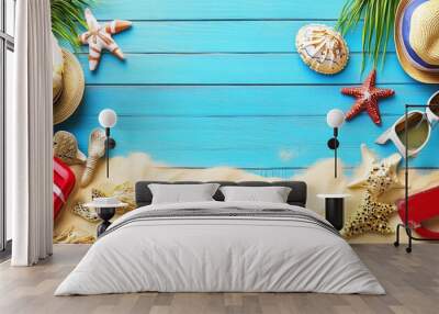 A colorful array of beach items set against a sandy backdrop. Wall mural