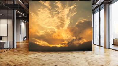 Colorful sunset sky with dramatic orange clouds. Only sky, no land. Wall mural