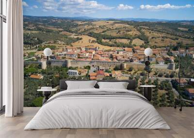 zoomed aerial view of the medieval town of Magliano in Tuscany Wall mural