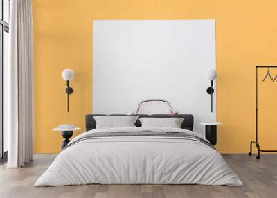 Red alarm clock and white mockup board on yellow background Wall mural