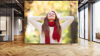 teen girl in red scarf at autumn outdoor Wall mural