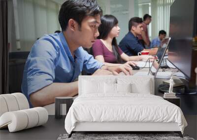 Asian Businessman Sitting At Desk Working Laptop Computer Busine Wall mural