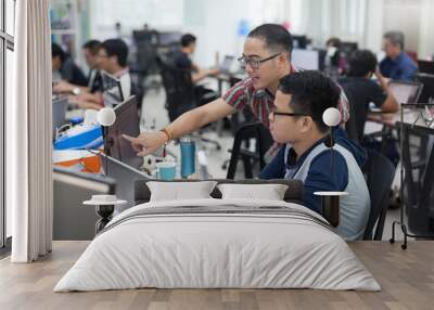 Asian Colleagues Software Developers Team Sitting At Desk Working Wall mural