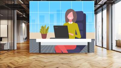 businesswoman sitting at workplace desk business woman using laptop working process concept modern office interior flat horizontal portrait Wall mural