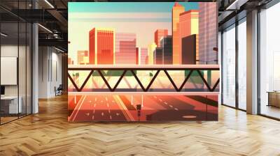 footbridge over highway asphalt road with marking arrows traffic signs city skyline modern skyscrapers cityscape sunset background flat horizontal Wall mural