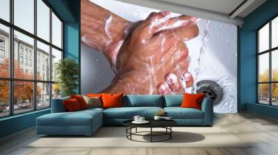 washing soapy hands Wall mural