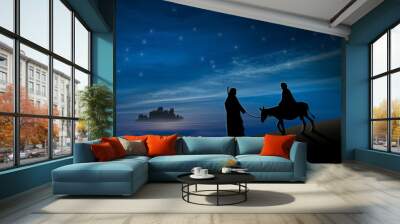 Christmas nativity scene of Joseph and Mary with donkey on the way to Bethlehem Wall mural