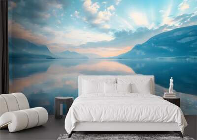 Beautiful light blue clouds and mountains reflected in the water at dawn. Natural background Wall mural