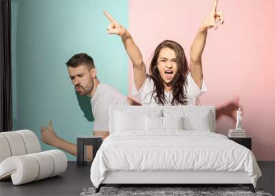 A couple of young man and woman dancing hip-hop at studio. Wall mural