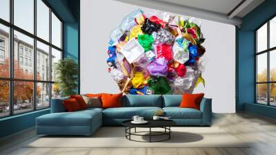 A globe of the earth with trash over white background, the concept of ecology problem and World Environment Day. Photo with message for social advertising, place for inscription Wall mural