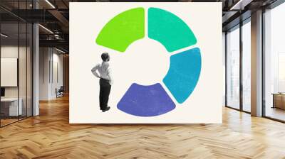 Art collage. Young man, office worker, employee standing in front of colored diagram isolated on light background. Concept of finance, economy, goals, achievements, occupation Wall mural