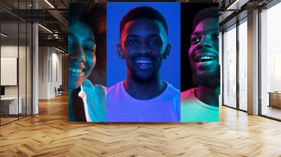 Close-up portraits of group of people on multicolored background in neon light, collage. Wall mural