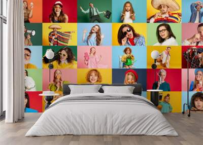 Collage made of portraits of beautiful young people, kids posing with diversity of emotions, having fun over multicolor background. Concept of human emotions, youth, lifestyle, facial expression. Ad Wall mural