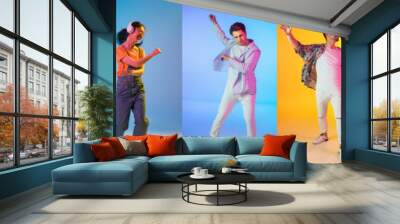 Collage of images of 7 models, men and women dancing, jumping isolated on multicolored background in neon light. Happy, joyful and cute people Wall mural