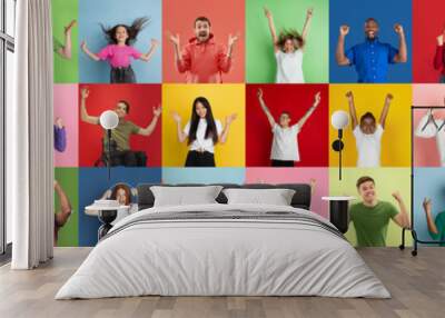 Collage of portraits of 31 young emotional people on multicolored background. Concept of human emotions, facial expression, sales. Look winning, celebrating, cheering, crazy happy and shocked. Wall mural