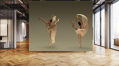 Collage of portraits of one young beautiful female ballet dancer dancing with fabric, cloth isolated on grey background. Wall mural