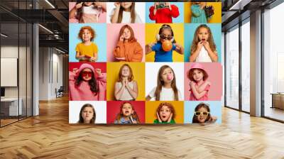 Collage. Portraits of cute emotional girls, children showing different emotions, posing over multicolored background. Diverse hobby, fun and game Wall mural