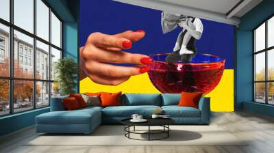 Contemporary art collage. Creative design. Cheerful couple dancing inside delicious alcohol cocktail. Party time, celebration Wall mural