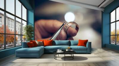 Different goldsmiths tools on the jewelry workplace. Jeweler at work in jewelry. Wall mural