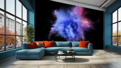 Explosion of colored, fluid and neoned powder on black studio background with copyspace Wall mural