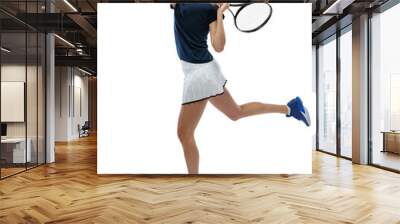 Full-length of young sportive girl, tennis player in motion hitting ball with racket isolated over transparent background. Concept of professional sport, competition, game, action, hobby. Wall mural