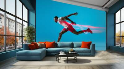 Full length portrait of active young muscular running man, Wall mural