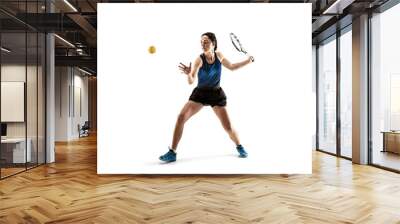 Full length portrait of young woman playing tennis isolated on white background. Healthy lifestyle. The practicing, fitness, sport, exercise concept. The female model in motion or movement Wall mural