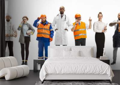 Group of people with different professions isolated on white studio background, horizontal. Modern workers of diverse occupations, male and female models like accountant, businessman, butcher, baker. Wall mural