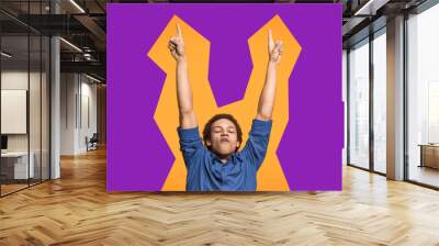 I won. Winning success happy man celebrating being a winner. Dynamic image of caucasian male model on orange studio background. Victory, delight concept. Human facial emotions concept. Trendy colors Wall mural