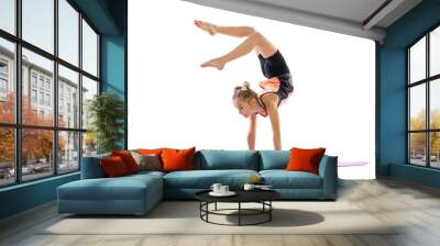 One flexible young girl, rhythmic gymnastics artist practicing isolated on white studio background. Grace in motion, action. Doing exercises in flexibility. Wall mural